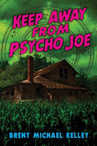 Cover for a book titled "Keep Away From Psycho Joe". It's a YA young adult comedy horror that takes place in a small Wisconsin town. The image shows the title, a spooky house with a cornfield in the front and green clouds in the background.
